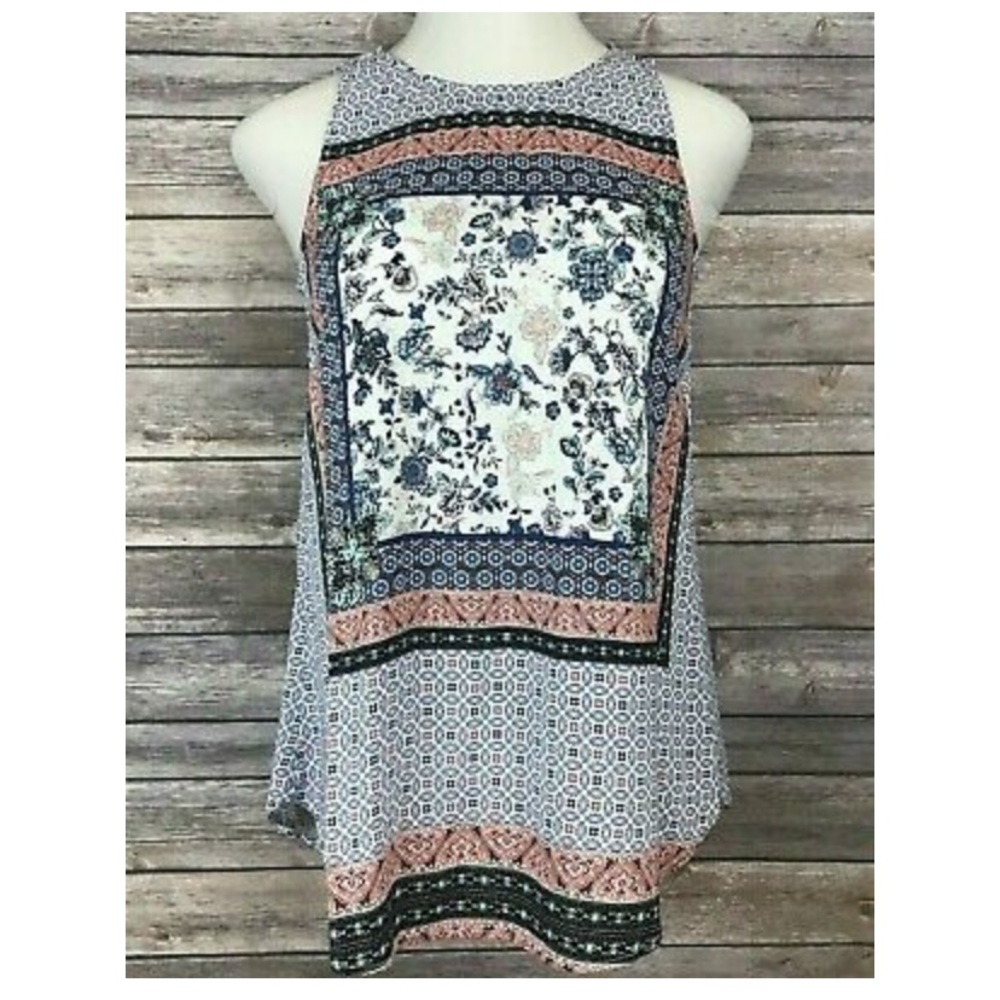Women’s long tank top with floral prints. Medium